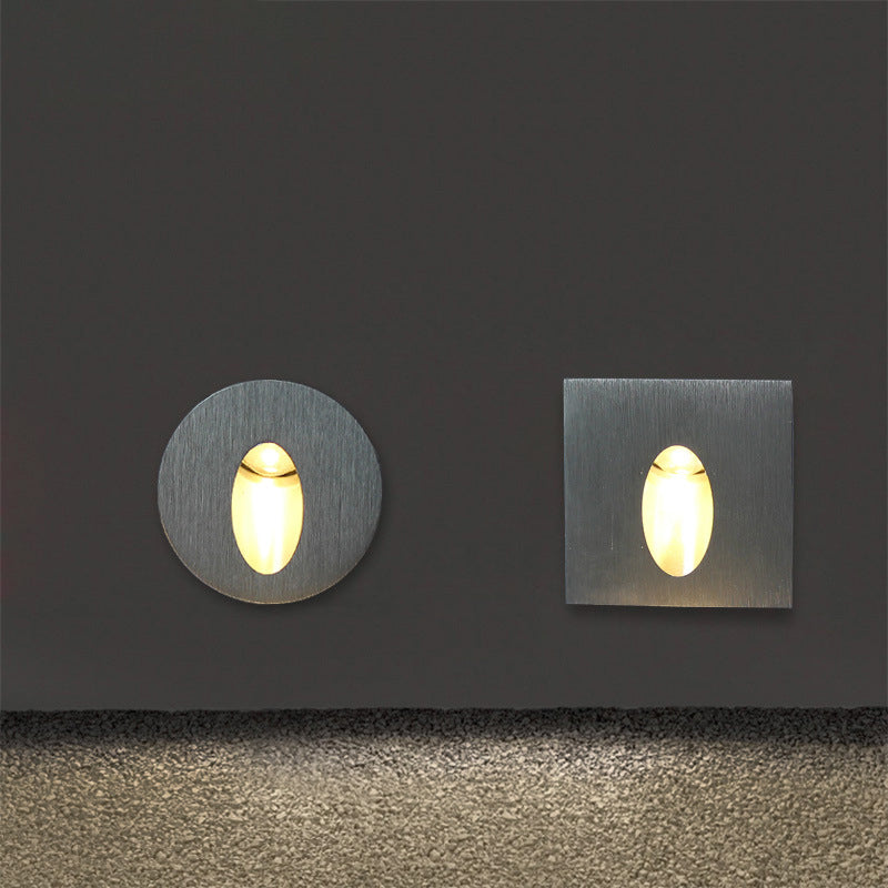 LumiGlow – moderne væglampe med oval åbning til blød og elegant omgivende belysning