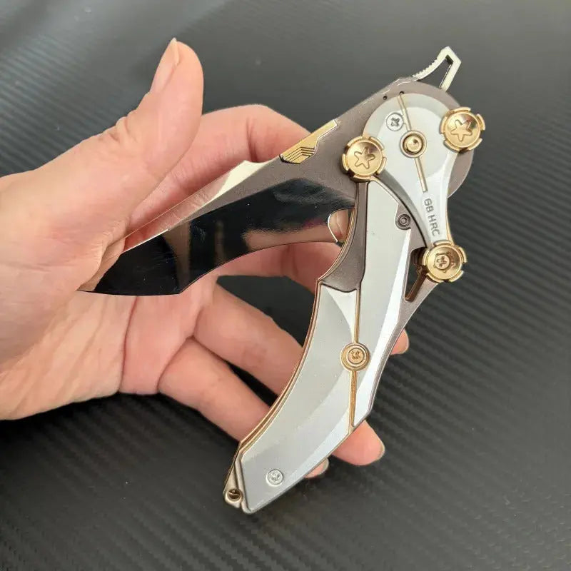 Folkedkniv i metal med kompakt design