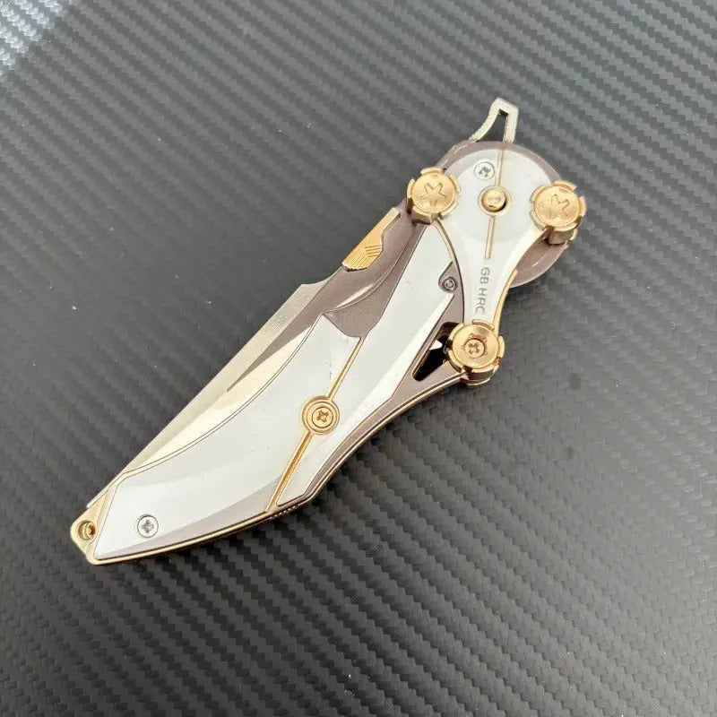Folkedkniv i metal med kompakt design