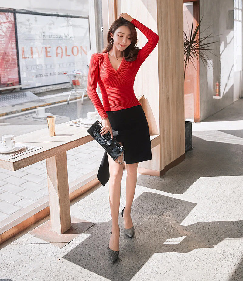 Ribstrikket sweater med V-hals