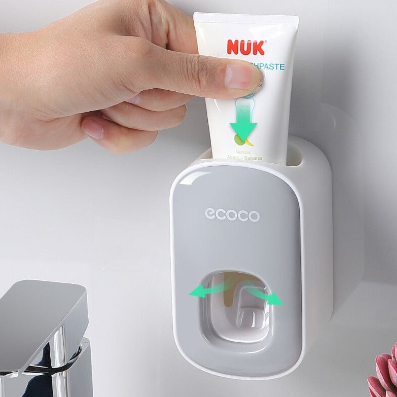 Vægmonteret automatisk tandpasta-dispenser