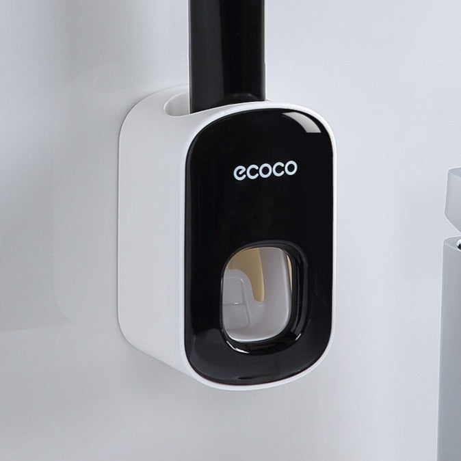 Vægmonteret automatisk tandpasta-dispenser