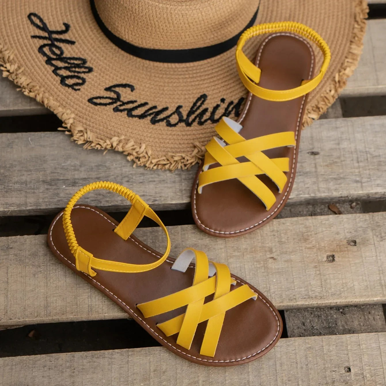 Flade sandaler med elastisk rem til kvinder