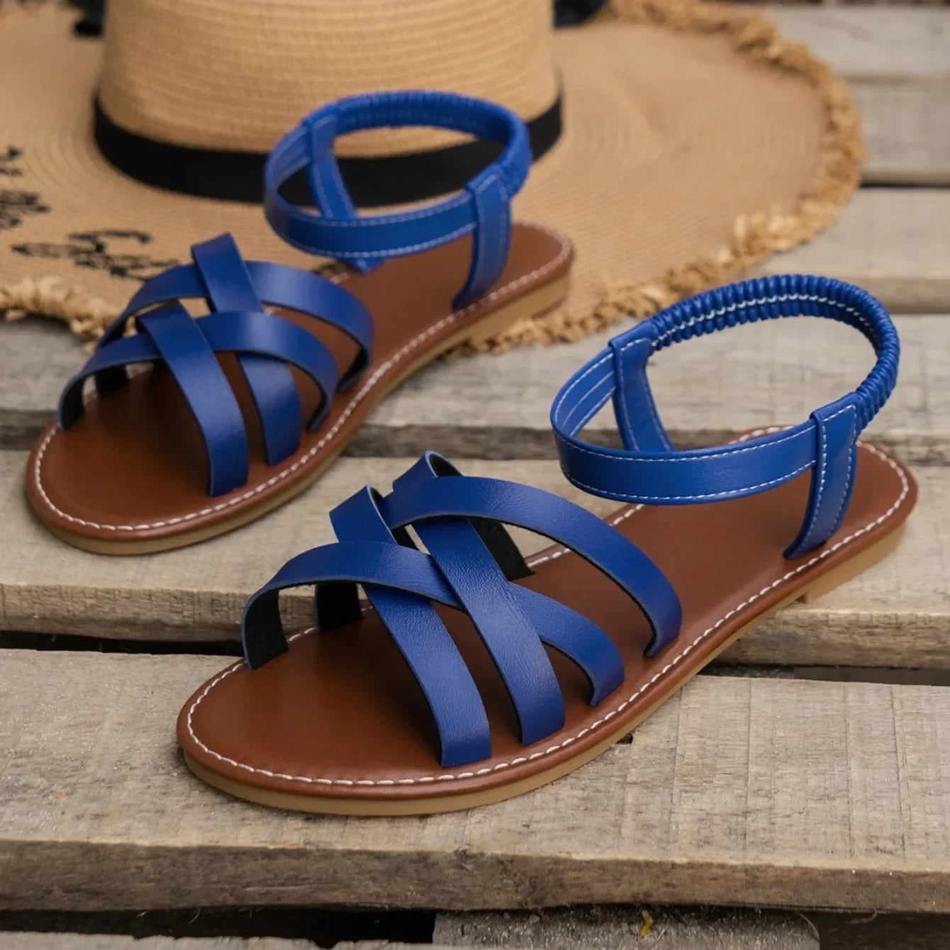 Flade sandaler med elastisk rem til kvinder