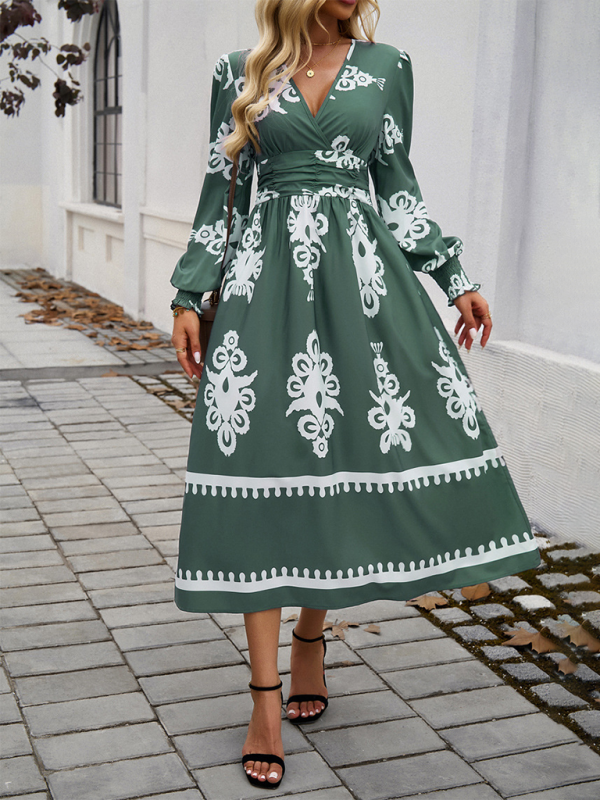 Midi Kjole i Sort og Hvid med Puffede Ærmer og Talje for Kvinder | Velegnet til Hverdagsoutfits