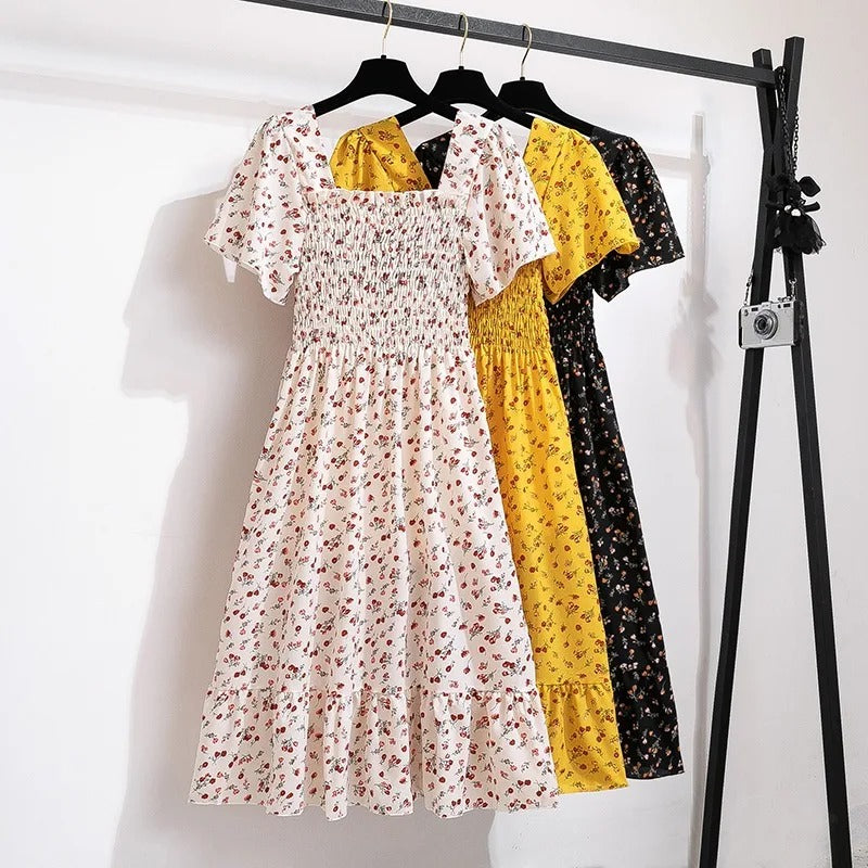 Midikjole i blomstret chiffon til kvinder
