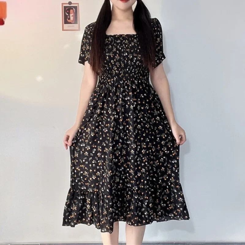 Midikjole i blomstret chiffon til kvinder