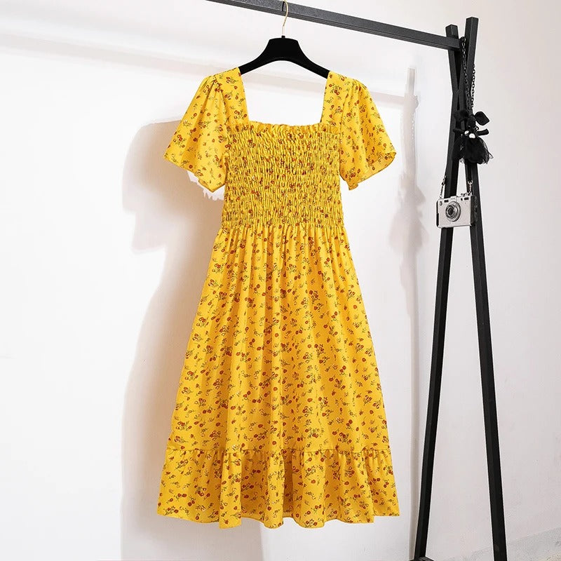 Midikjole i blomstret chiffon til kvinder