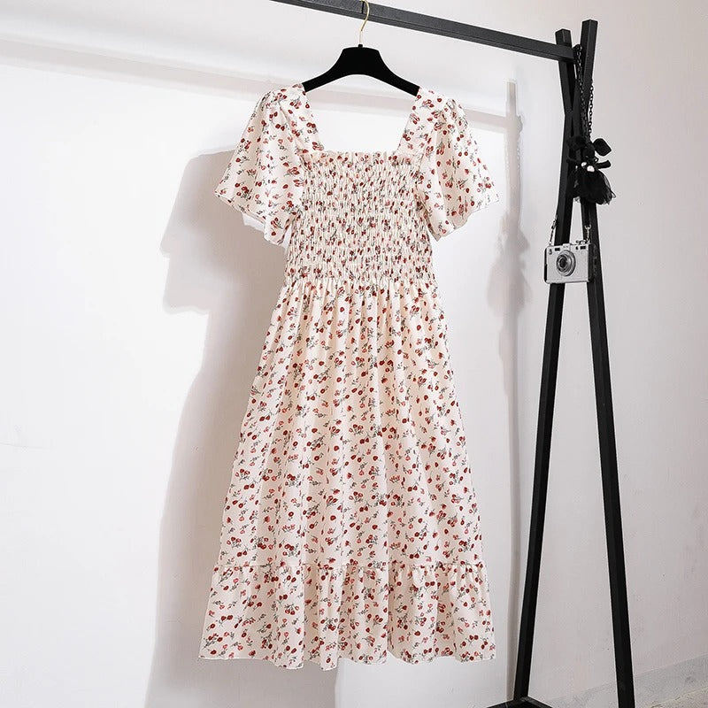 Midikjole i blomstret chiffon til kvinder