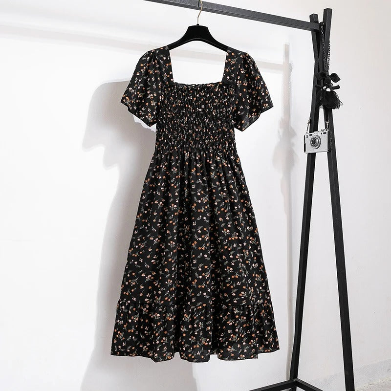 Midikjole i blomstret chiffon til kvinder
