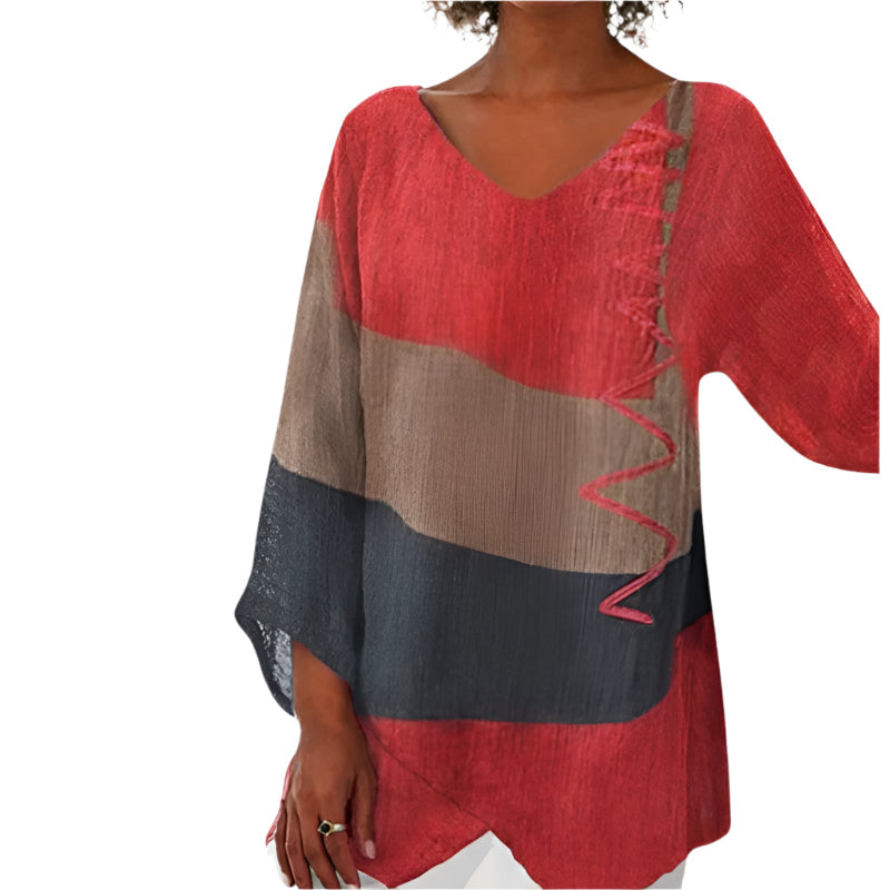 Kvinders Bluse i Flydende Design og Let Materiale