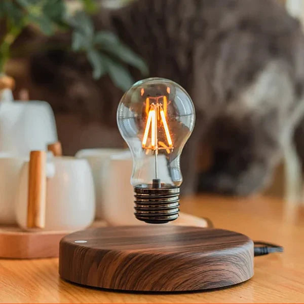 Moderne Bordlampe med Flydende Design og Valnøddebasis