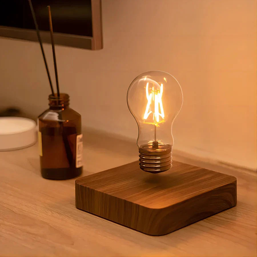 Moderne Bordlampe med Flydende Design og Valnøddebasis