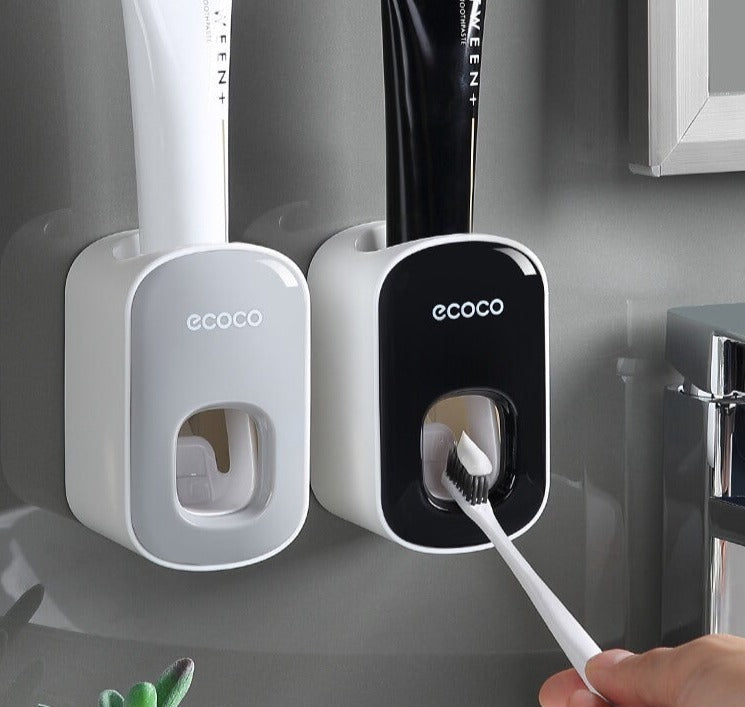 Vægmonteret automatisk tandpasta-dispenser