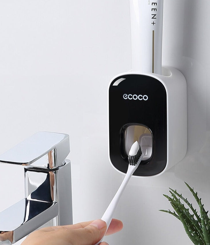 Vægmonteret automatisk tandpasta-dispenser