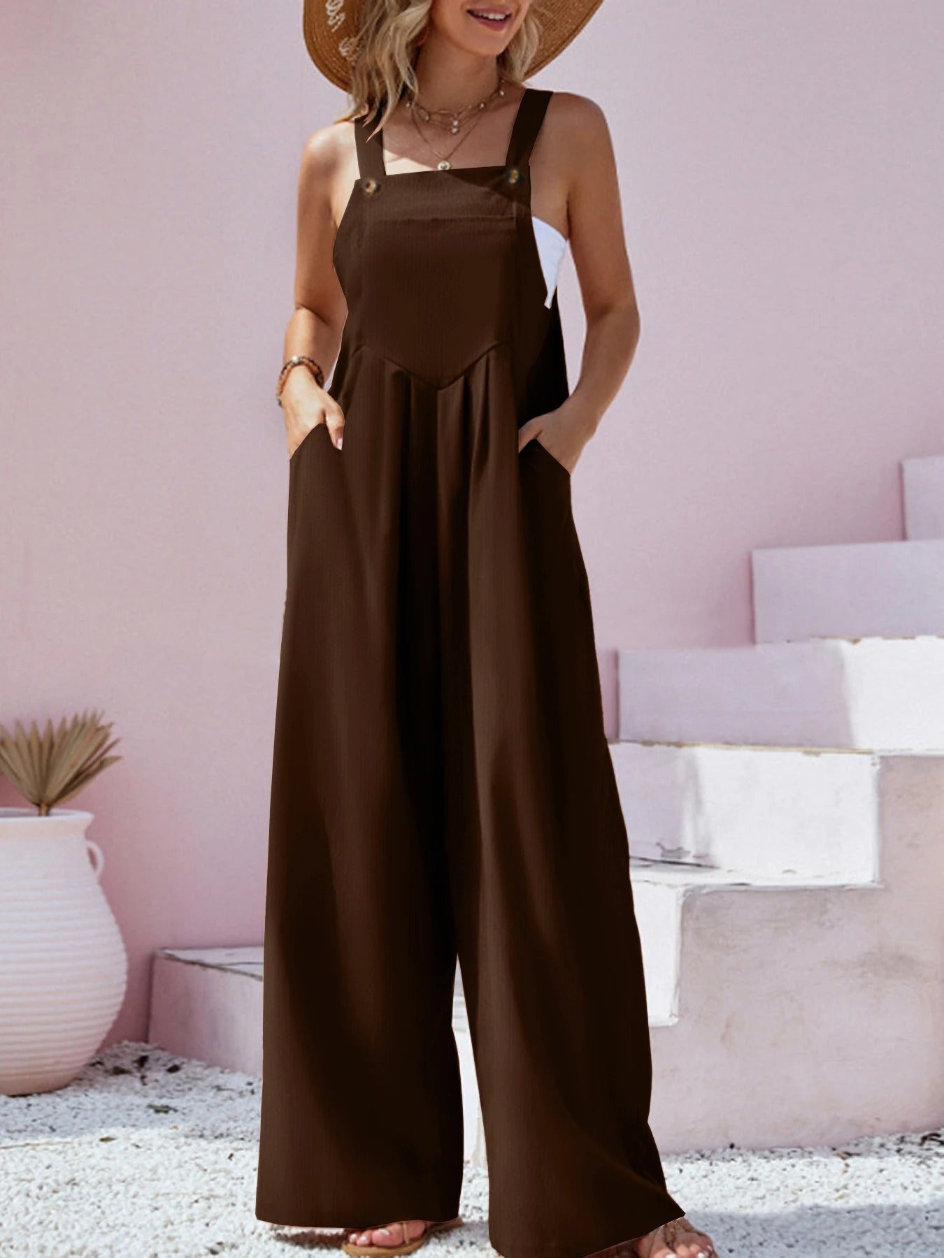 Ensfarvet suspender jumpsuit til kvinder