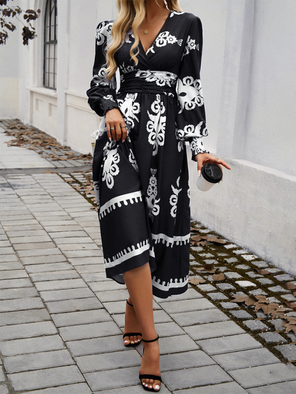 Midi Kjole i Sort og Hvid med Puffede Ærmer og Talje for Kvinder | Velegnet til Hverdagsoutfits