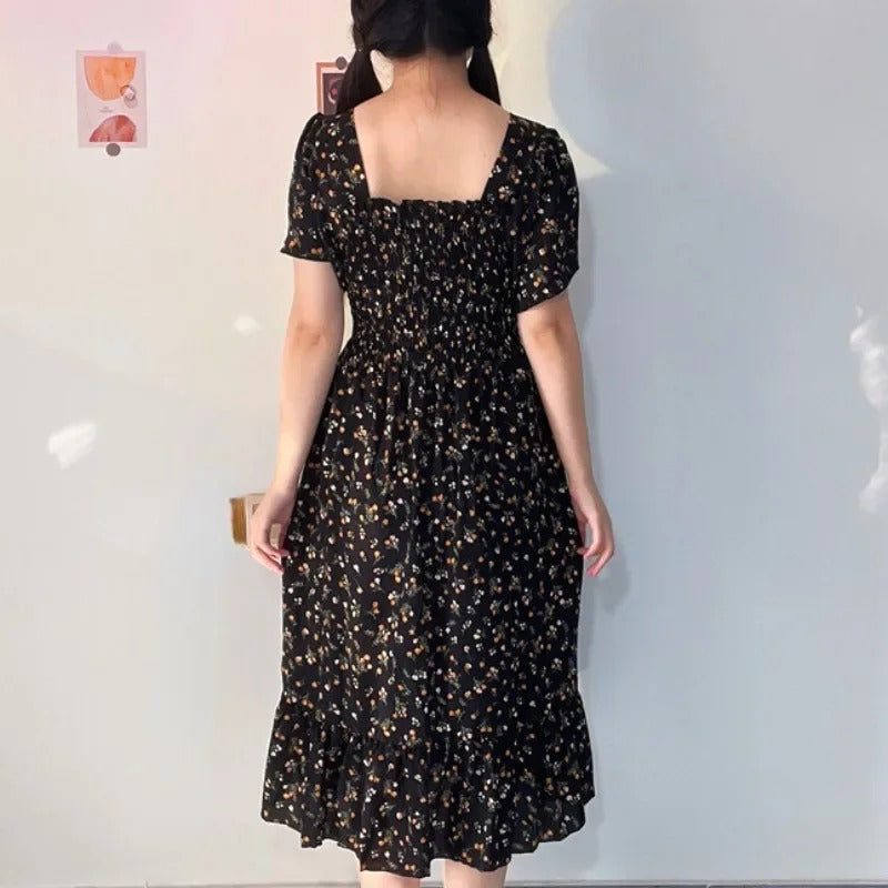 Midikjole i blomstret chiffon til kvinder